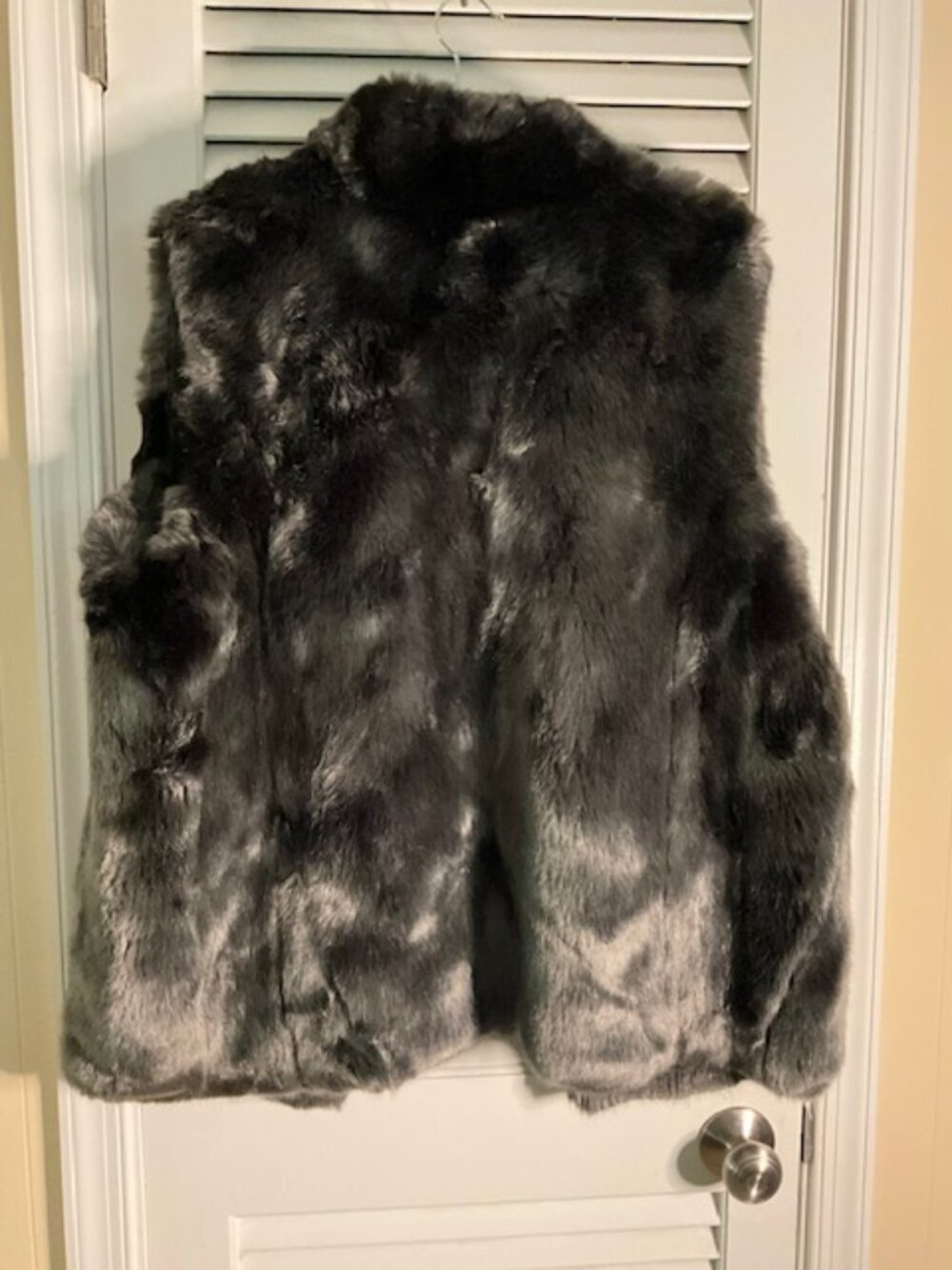 Fabulous Furs brand dark gray and black faux fur vest.